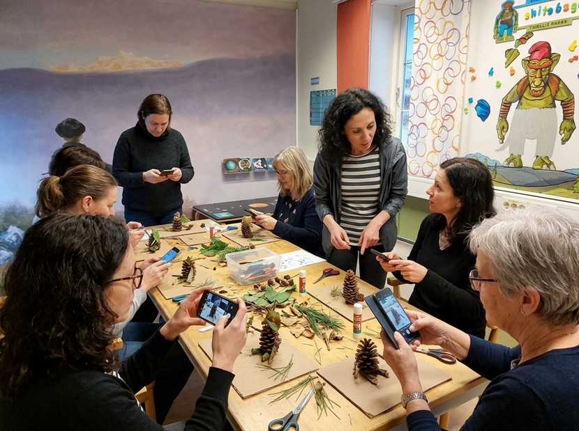 a person reading in tromso troll museum library
