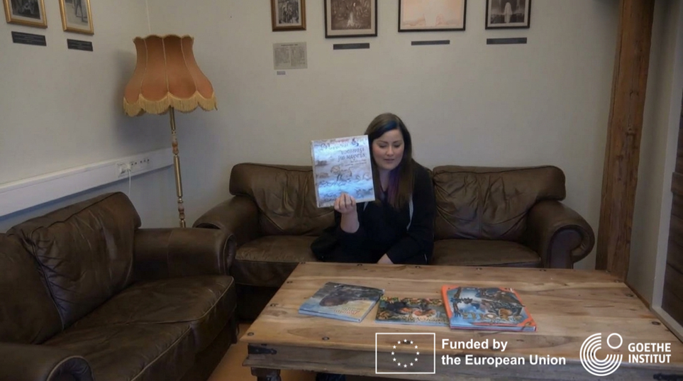 tromso troll museum managers with books